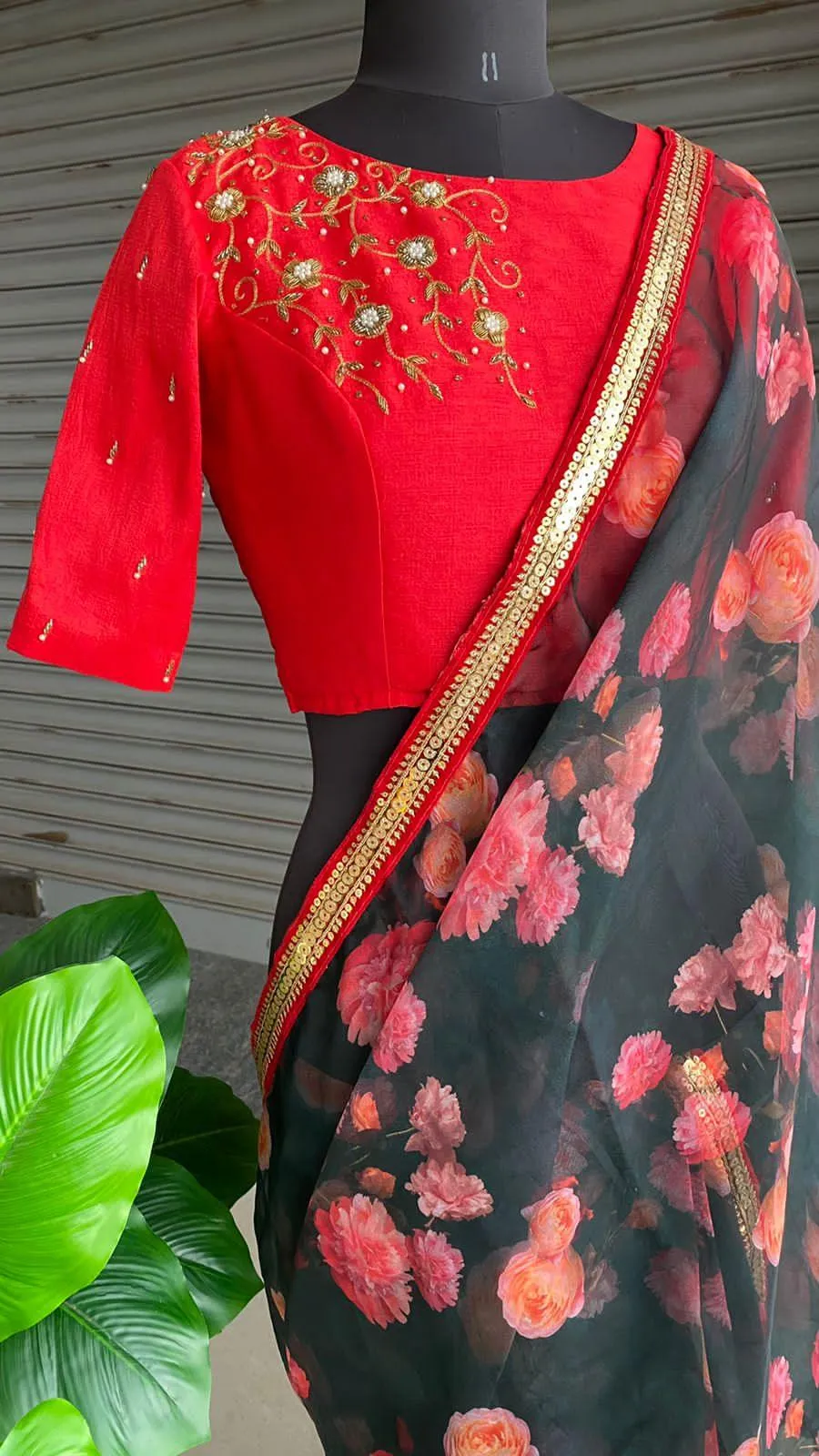 Deep blue floral soft organza saree with hand worked blouse