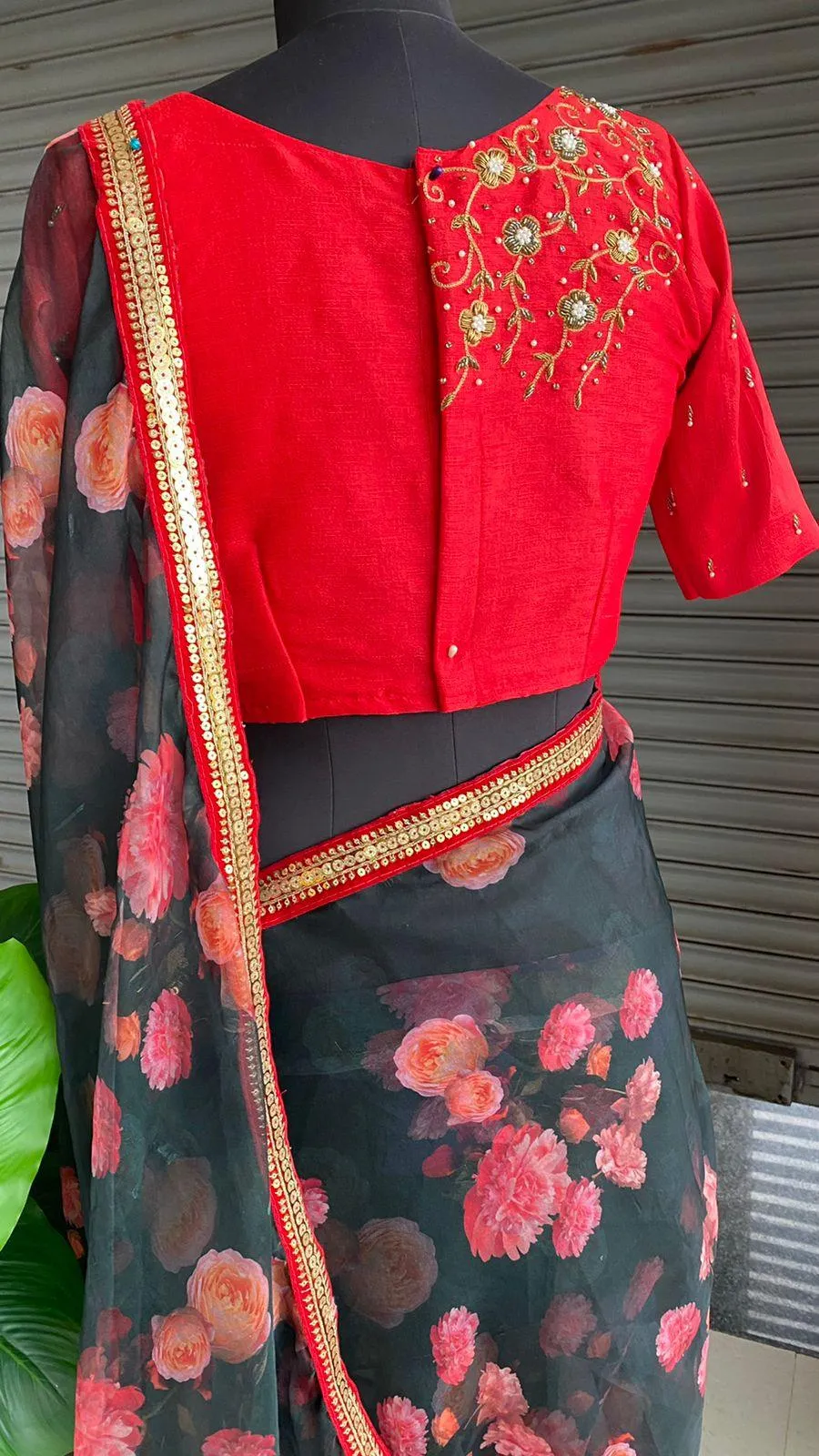 Deep blue floral soft organza saree with hand worked blouse