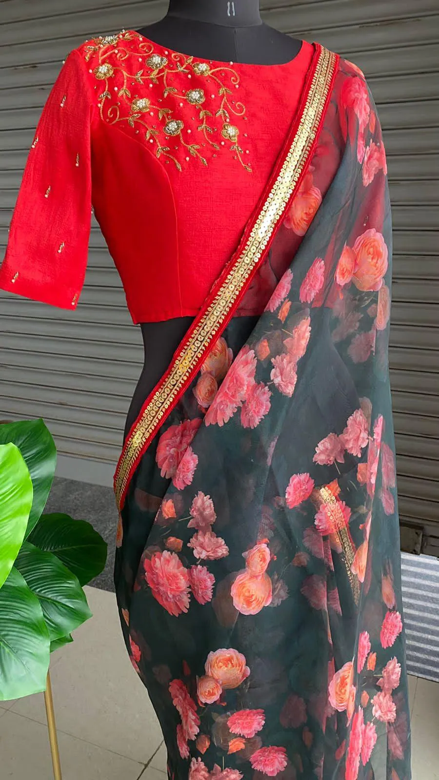 Deep blue floral soft organza saree with hand worked blouse