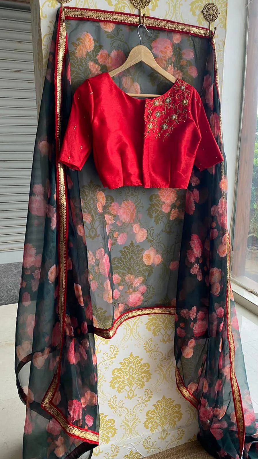 Deep blue floral soft organza saree with hand worked blouse