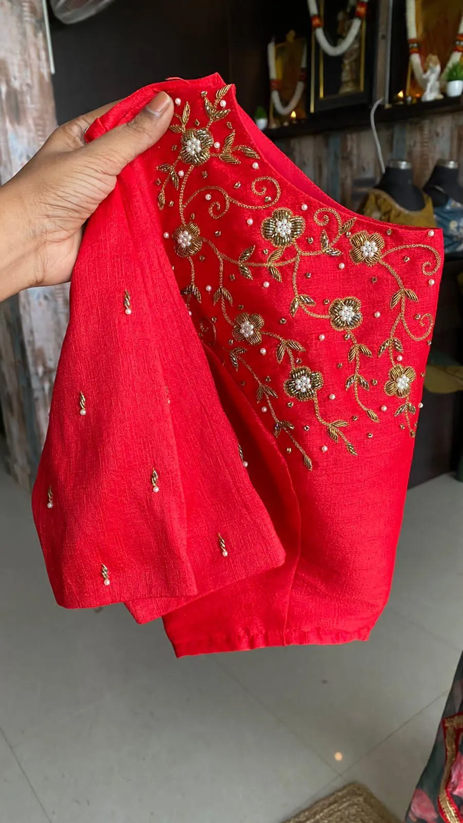 Deep blue floral soft organza saree with hand worked blouse