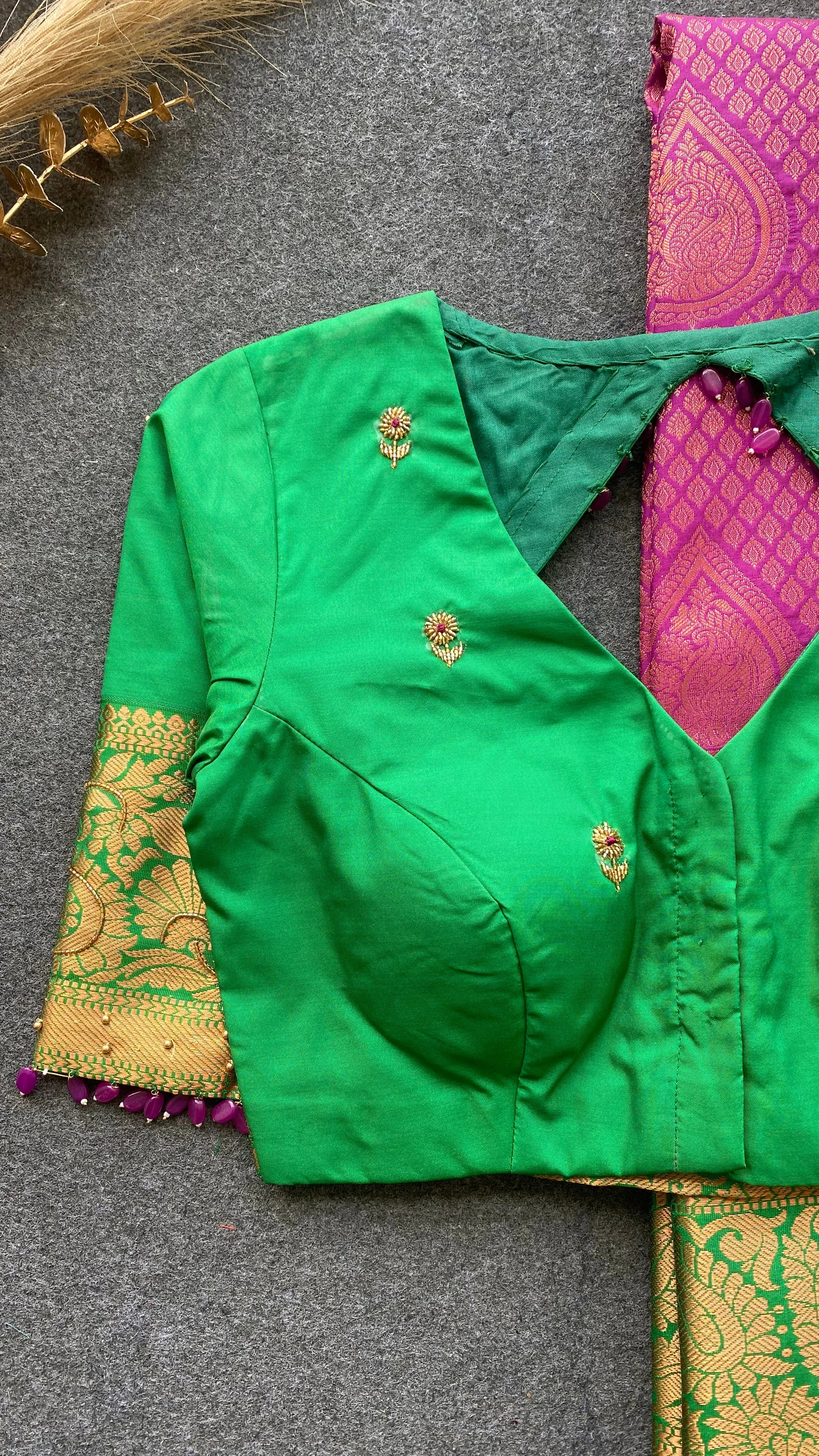 Rani pink and green silk saree with hand work blouse